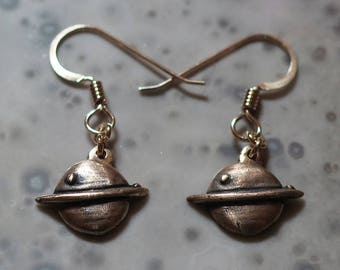 Little bronze Saturn earrings