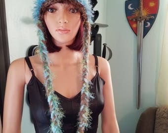 Hat with cat ears in blue brown and cream with braids and a flower