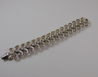 Vintage CORO Silver Tone Swirl with Clear Rhinestone Bracelet