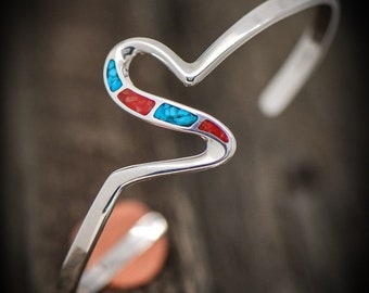 Sterling Silver cuff bracelet with inlaid Kingman Turquoise and Red Coral