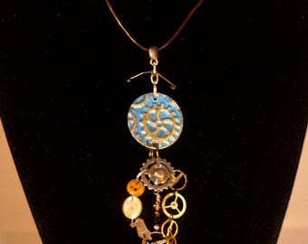 Crafted metal and steampunk pendant