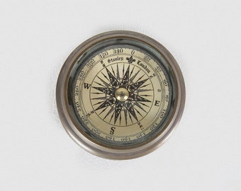 brown brass compass