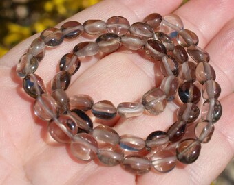 4 BEADS QUARTZ SMOKE SHAPES OVAL 7-8 X 7-8 X 4-5 MM.