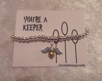 Harry potter inspired bracelet, golden snitch bracelet, Harry Potter fan gift. harry potter stretch bracelet