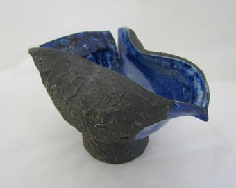 Studio pottery Swedish pottery candle holder by Yngvor Blomstrom A brown candleholder in form of a bird with blue drip glaze interior