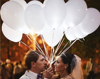 White LED Balloons that Glow. Wedding Send off! Light up the sky. Sending your wishes!