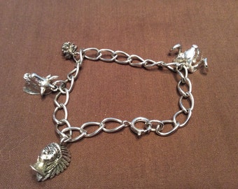 Vintage 1970's Southwest Sterling Silver Charm Bracelet With 4 Charms all Hallmarked and 925