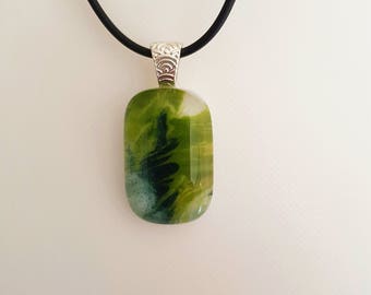 Swirly green and blue fused glass pendant