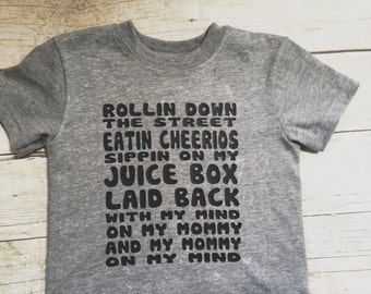 A "Rollin down the street" body suit or toddler t-shirt