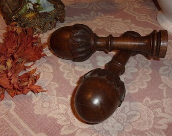 2 old carved wooden curtain rod brackets