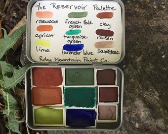 The Reservoir Palette, a set of 9 handmade watercolors in a tin