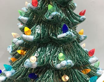Handmade ceramic 16" Christmas Tree with snow and green base