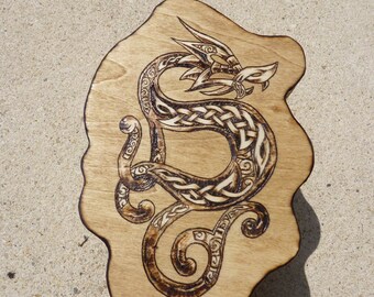 Available: box asymmetrical Celtic dragon round