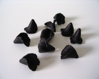 10 black lucite flowers