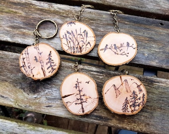 Woodburned Art Nature themed keychains, pyrography art, live edge wood slices, Mountains, Eagles, Birch trees, Birds or Rushes, nature lover