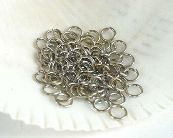 100 rings silver metal stainless steel 5 mm