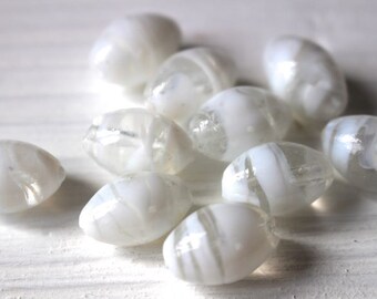 white oval glass swirl beads