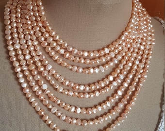 Pearl Necklace. 8 laps from major to minor. From the 64cm to the 42
