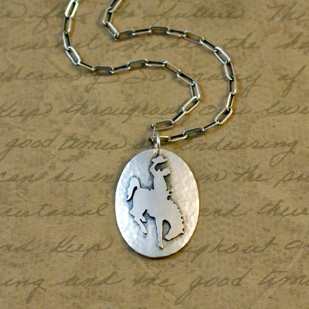 Sterling silver Wyoming bucking bronco horse necklace