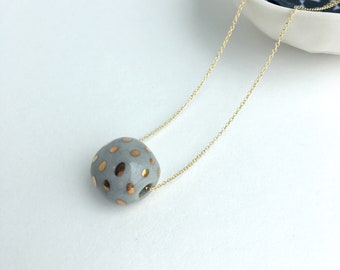 gold dots on marbled grey bead // porcelain necklace