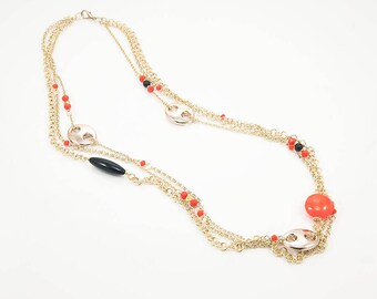 Gold chains, onyx, Murru and crystals.