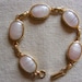 Vintage Costume Gold Tone Scarab Oval Cabochon Pink Shadows Faux Agate Translucent Stone Link Bracelet Sarah Coventry