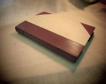 Traditional bookbinding - book repairs - new cover