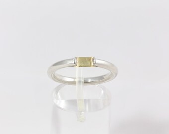 Zilveren ring met 18 karaats gouden detail