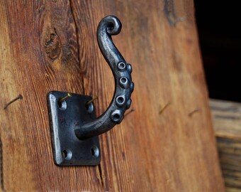 Curved hand forged Cthulhu tentacle wall hook, inspired by Lovecraft and his Cthulhu Mythos, tentacle, forged tentacle