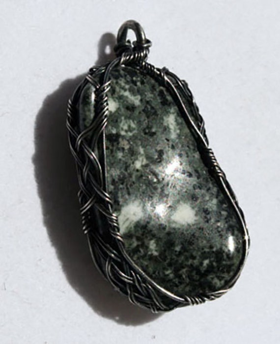 Preseli blue stone wrapped in a Celtic style with oxidized silver