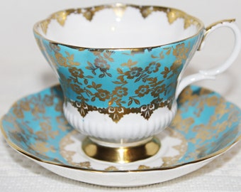 ROYAL ALBERT Turquoise Teacup and Saucer from Consort Series Turquoise Blue and Gold Chintz Lovely