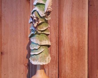 Hand carved evergreen tree with snowy owl