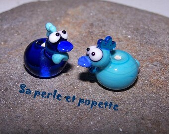 Couple-turquoise and transparent turquoise chicks