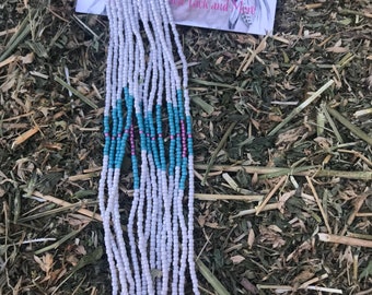 Long swiping cream beaded earrings