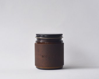 Woods candle - patchouli cedarwood and pine scented leather wrapped candle