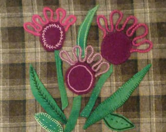 wool applique/hand embroidered thistle cushion