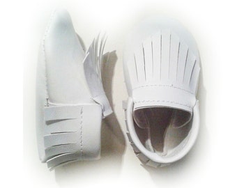solid white moccasins