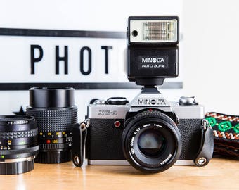 Minolta XG - A + 50 mm f1, 7 + Minolta 135 mm 3.5 28mm f3, 5 Flash Minolta 30FX - in original boxes