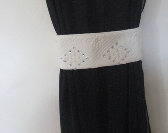In white pique curtain tiebacks