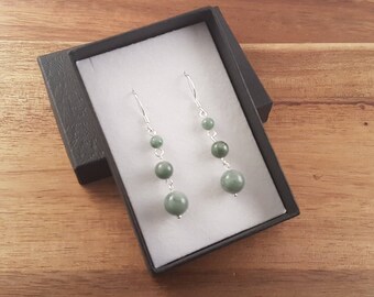 Green Burmese jadeite and sterling silver graduated earrings