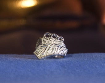 Asymmetric ring shape and 3 holes
