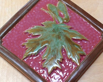 6 inch Maple Leaf Tile for fireplace or kitchen with deep rose and green glaze.