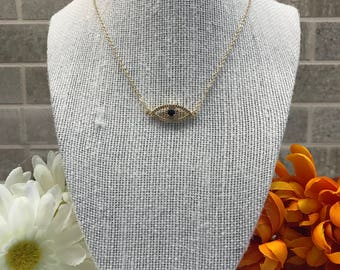 Golden chain with eye-shape I said