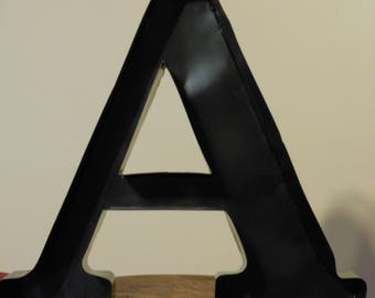 A Large, Black Metal Letter A