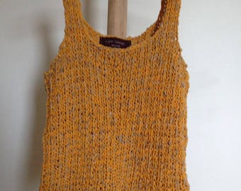 Red knit sleeveless sweater