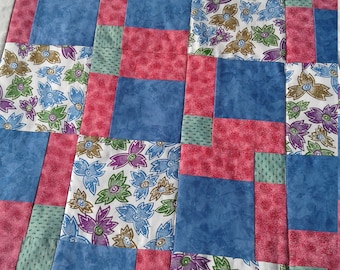 Tropical flowers lap quilt