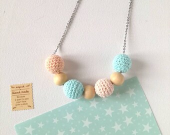 Natural wood necklace with crocheted cotton balls
