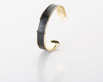 24 k gold and black herringbone cuff