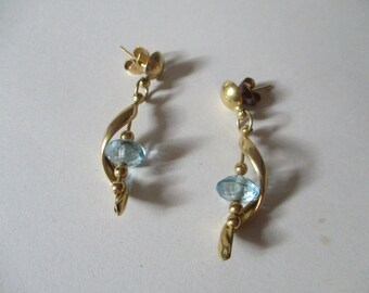 Gold earrings with topaz