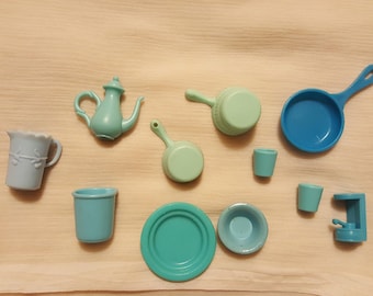 1980s Barbie plates, cups, pots, and pans -- including what look as if they were tiny versions of Fiestaware